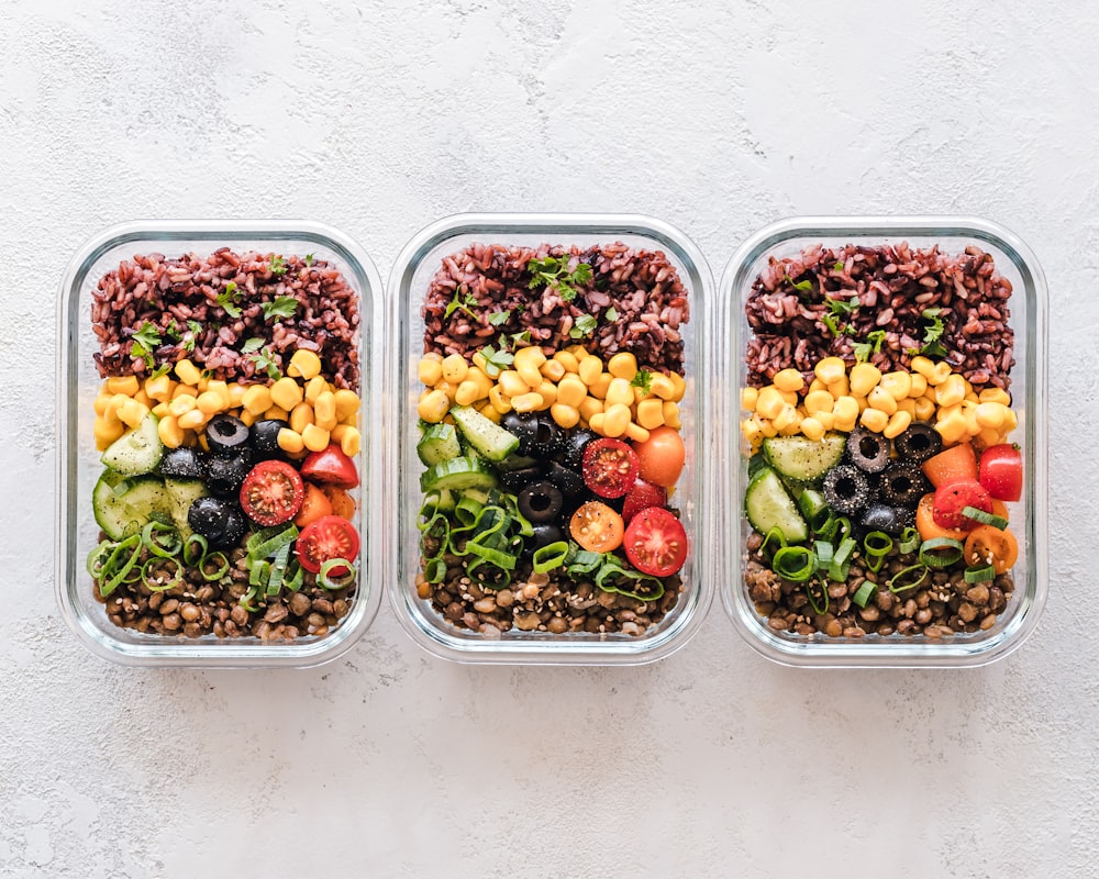 Nutritionist consulting with male client on meal planning